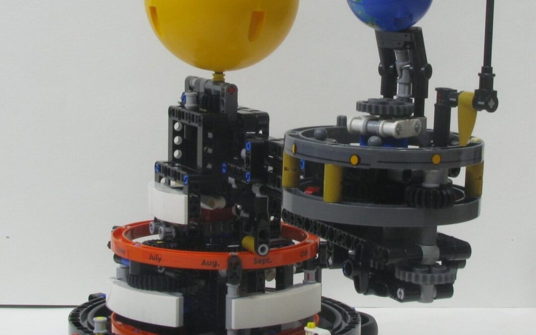 Falling Down The Gravity Well: Orbits of the LEGO Orrery